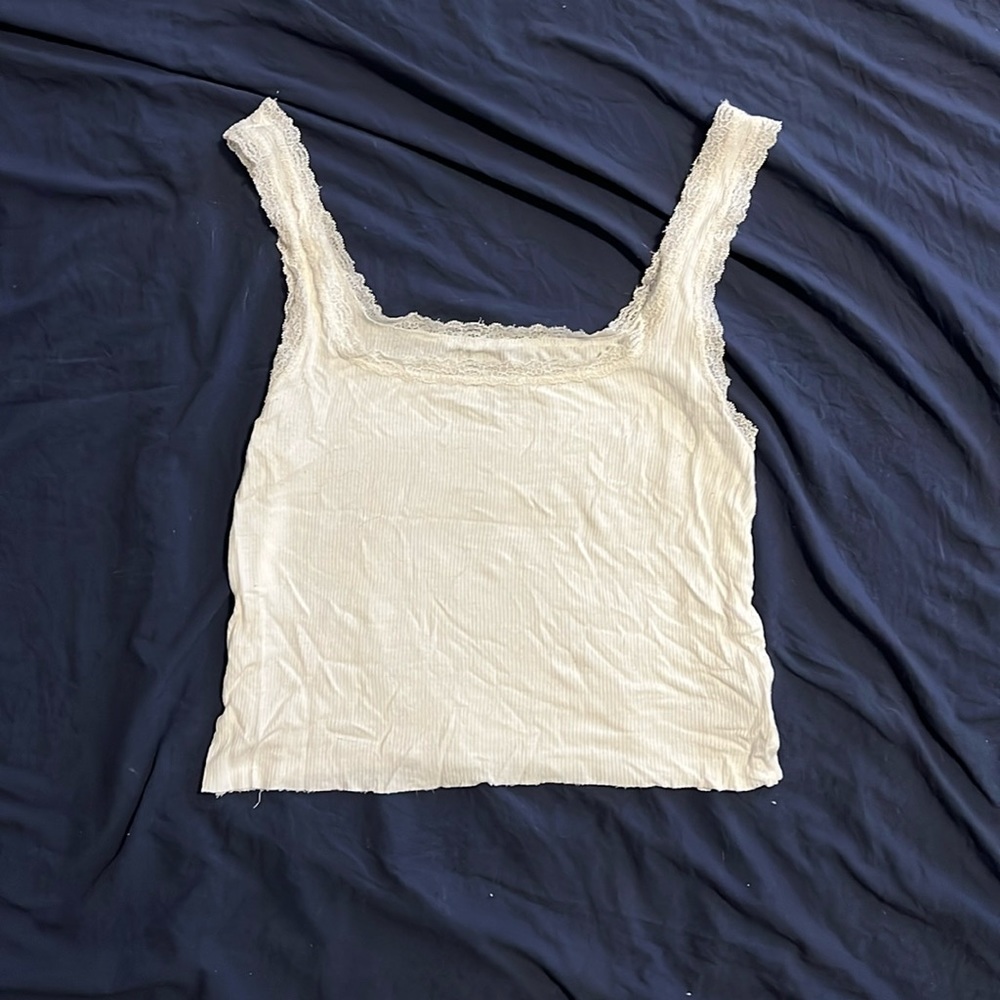 White, silky tank top with lace